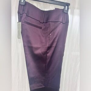 Caché brand , pants color plum , size 6 new with tag, Satin fabric spandex